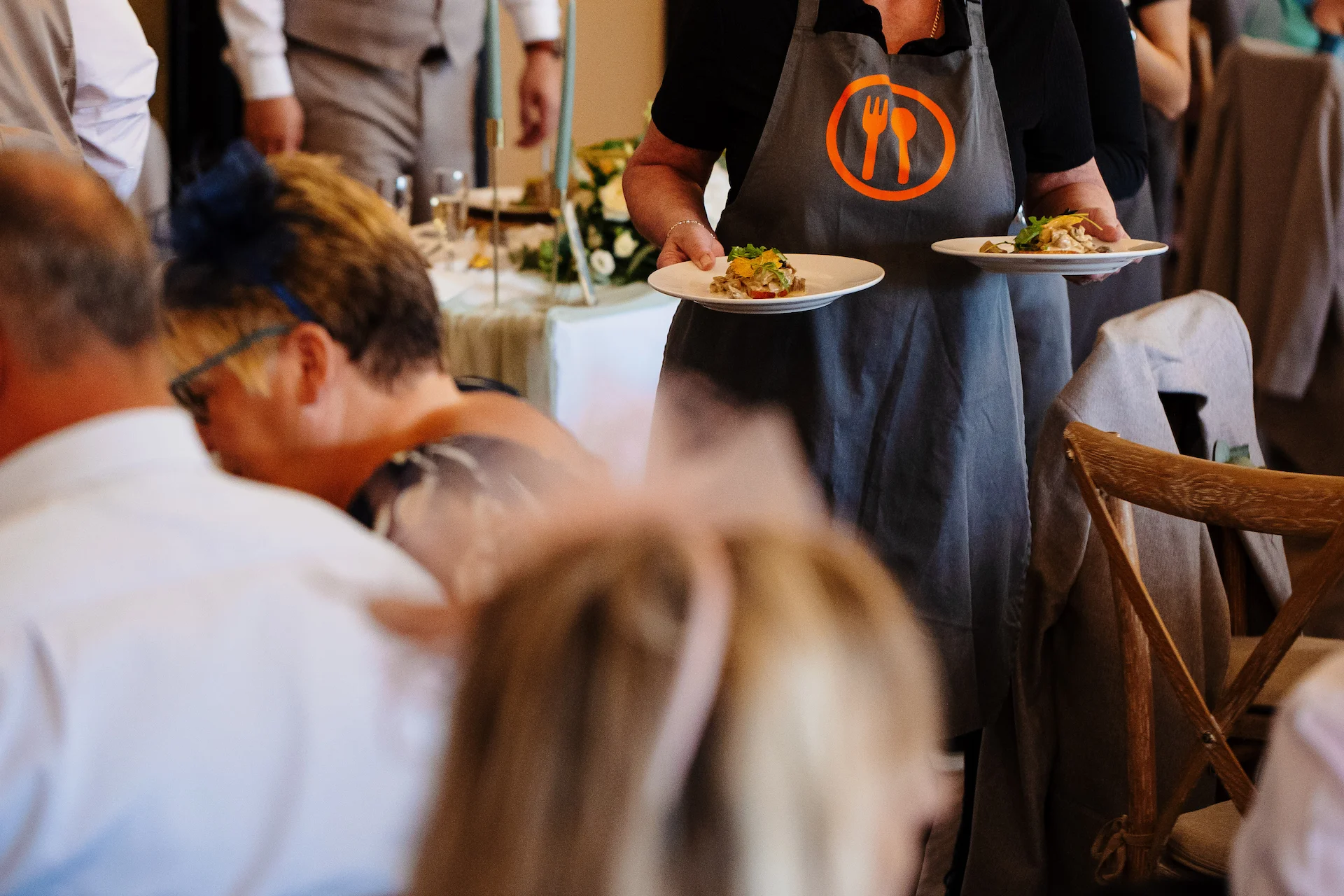 Servers Serving Food